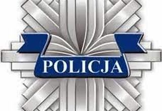 Logo Policji w formie gwiazdy. Na środku na granatowym tle napis Policja.
