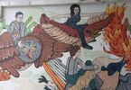 Kolorowy mural. Kobieta i dwóch mężczyzn lecą na ptakach