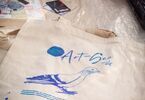 Bawełniana torba z odbitym napisem Art-Geo i narysowanym gołębiem