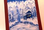 Kartka przedstawiająca domek w zimowej scenerii