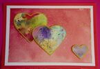 Trzy serca namalowane akwarelami