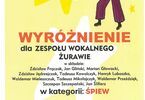 Zdjęcie dyplomu Wyróżnienia dla zespołu Żurawie. Napisy czerwone i czarne na żółtym, po prawej stronie grafika mężczyzny