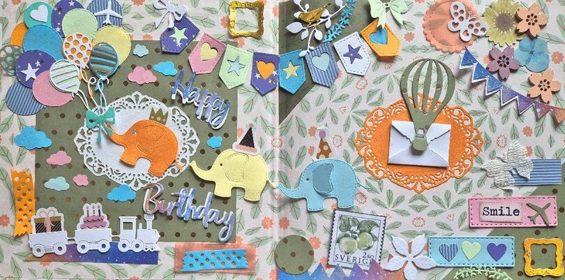 Zdjęcie: kartka wykonana  w technice scrapbookingu ze słonikami