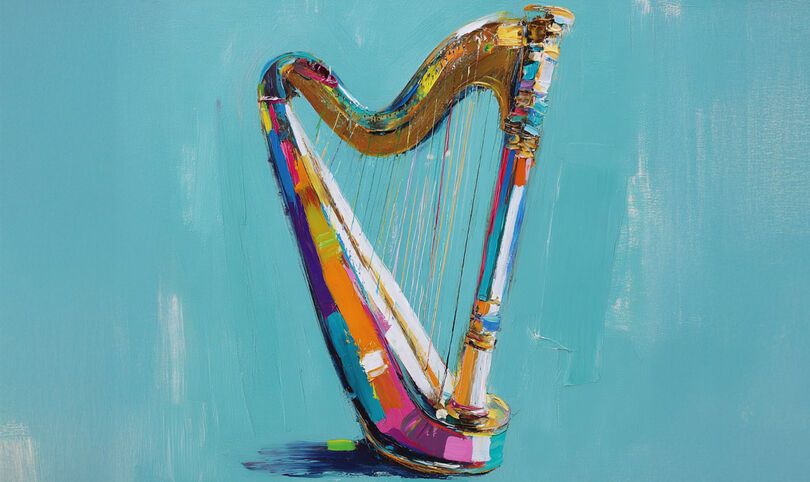 Zdjęcie: kolorowa harfa na turkusowym tle