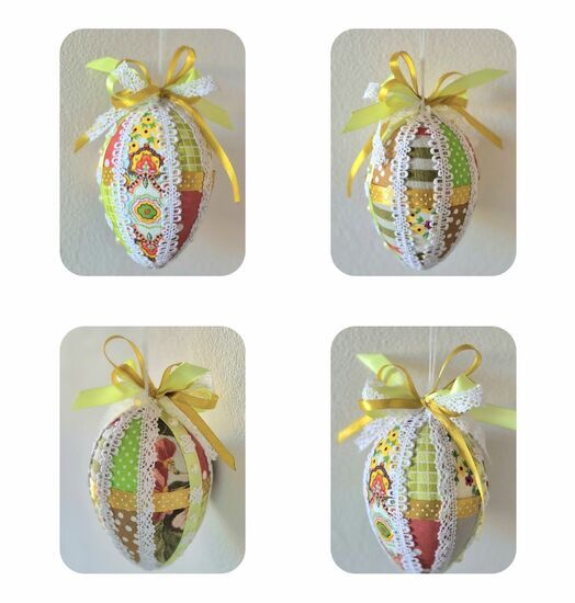 Zdjęcie: cztery pisanki w żółto-białej kolorystyce wykonane techniką patchwork